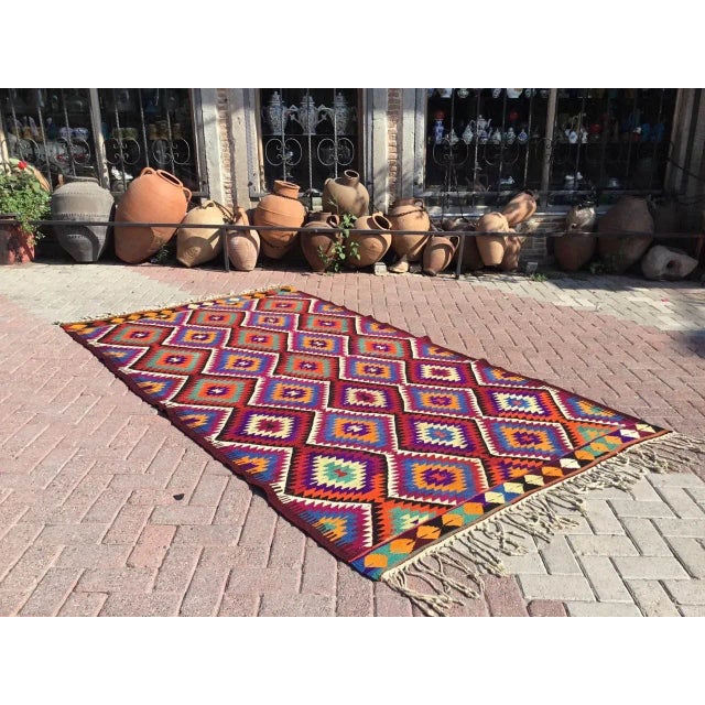 This beautiful, vintage, handwoven kilim is approximately 50 years old. It is handmade, of very fine quality hand spun...