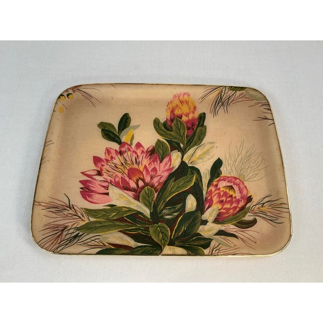 Add a touch of South African vintage flair to your home with this unique floral tray. This piece was made by Toro Designs...