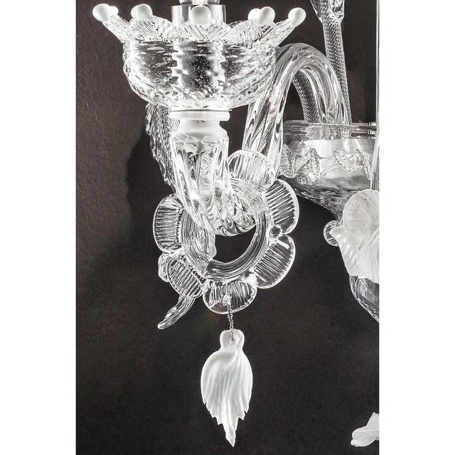 Venetian floreal Murano glass chandelier with transparent leaves and flowers pinched by hand full of precious white...