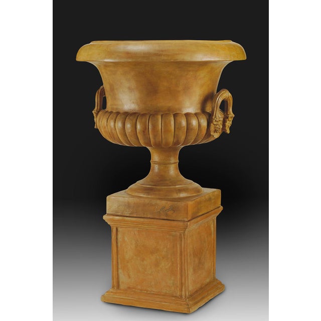 This impressive pair of 4-foot planters is handcrafted from natural terracotta and finished with a soft, matte glaze that...