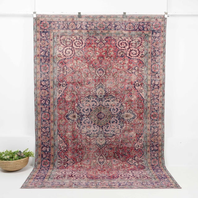 Vintage Turkish Hand-Knotted vintage rug is a semi-antique vintage Area rug.'70s Eastern region of Turkey's unique rug is...