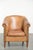 We are offering this distinctive sheepskin club armchair in a light cognac color, finished with decorative studs. This...