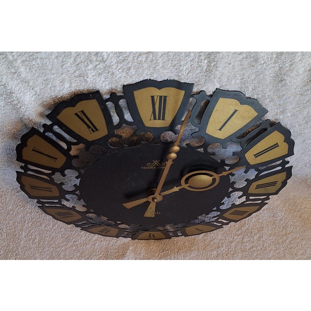 Vintage Rustic Wall Clock by Meister-Anker, 1970s, in Very Good conditions. Designed 1970 to 1979 This piece has an...