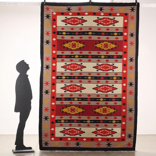 Cotton Kilim carpet, fine knot, manual production. This piece is attributed to the mentioned designer/maker. It has no...