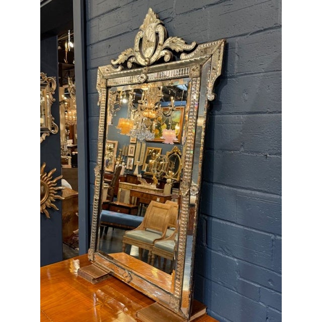The Vintage Venetian Etched Glass Mirror is a unique and elegant piece that adds a touch of style to any home. With...