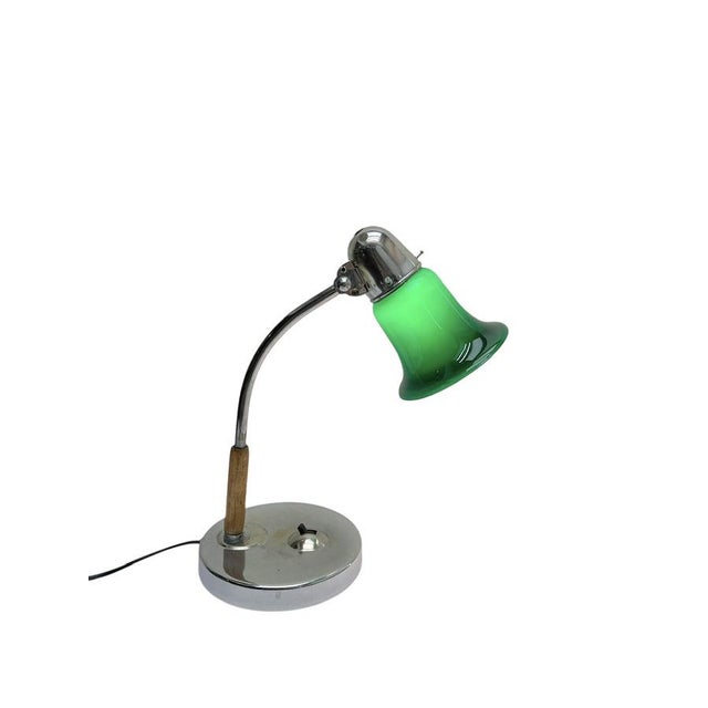 Rare Art-Deco desk lamp by Adem from The Netherlands. Featuring from a chrome-plated metal base and curved arm, combined...