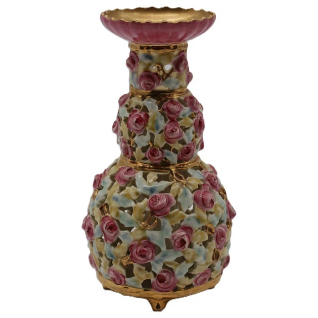 Description A sumptuous hand-modeled porcelain vase by Zsolnay of Pécs, richly adorned with applied rosebuds and openwork...