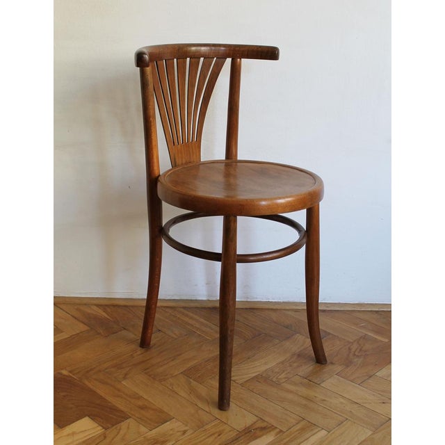 This is an original set of two dining chairs produced by Ungvar Furniture Company in Uzhorod. This factory was part of...