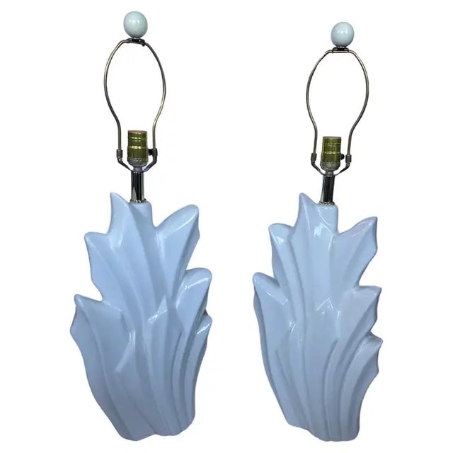 Fabulous Hollywood Regency style pair of palm form glazed ceramic table lamps by Harris. These white high gloss lamps...