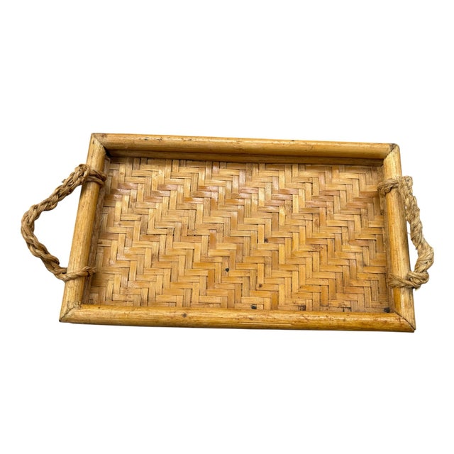 Vintage Chinese woven bamboo serving tray featuring a distinctive herringbone-patterned surface, substantial rounded...