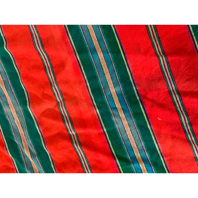 Stunning vintage and vibrant Mexican Saltillo wool blanket serape. Beautiful jewel tone shades of reds, pinks, turquoise,...