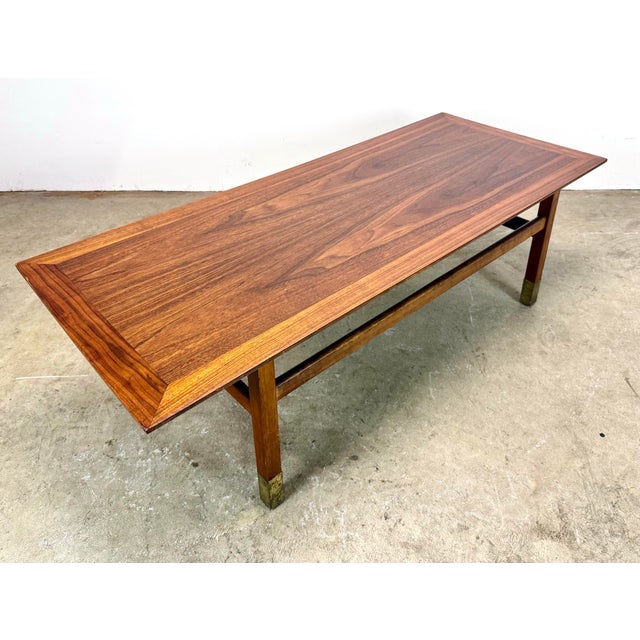 A circa 1970’s walnut coffee table by Jack Cartwright for Founders Furniture (unsigned). Top has been newly restored in...