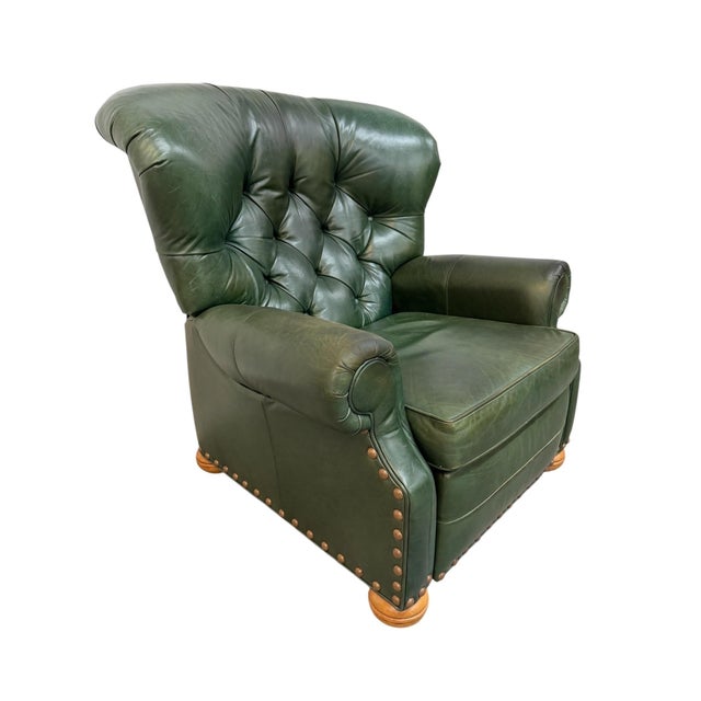 Handsome vintage Ethan Allen reclining lounge chair, upholstered in rich forest green leather with a beautifully aged...