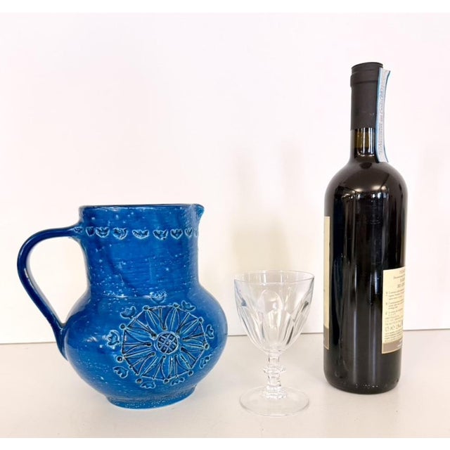 Handmade in Italy, 1960s. This jug is made in Rimini blue lacquered ceramic. It is a vintage item, therefore it might show...