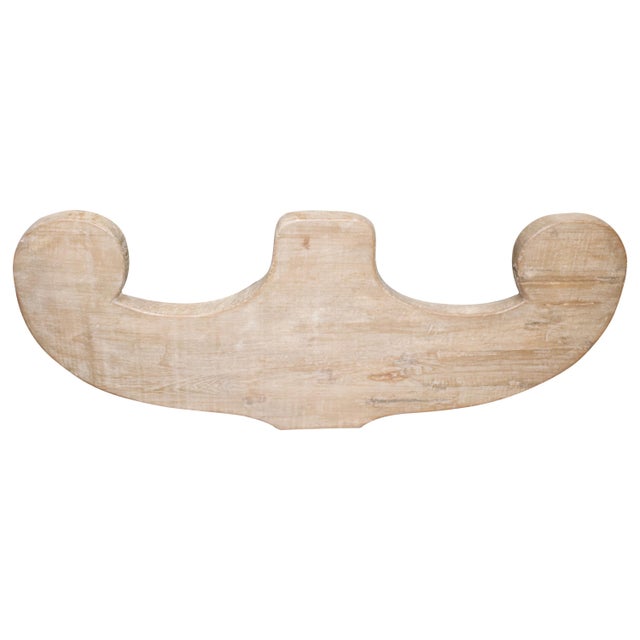 Hand carved from a single piece of teak wood a beautiful simple carving which works well for an art installation or as a...