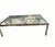 This rectangular solid iron and glass coffee table is inspired by classic vintage designs, featuring a 1/4" glass top and...