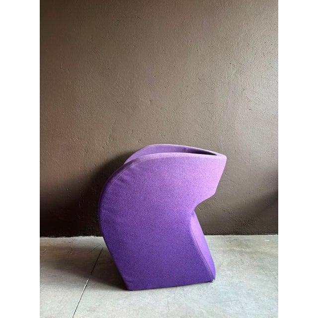 Ron Arad's landmark "Little Albert" chair, designed in the 90s and created in 2000, in vivid purple wool upholstery. This...