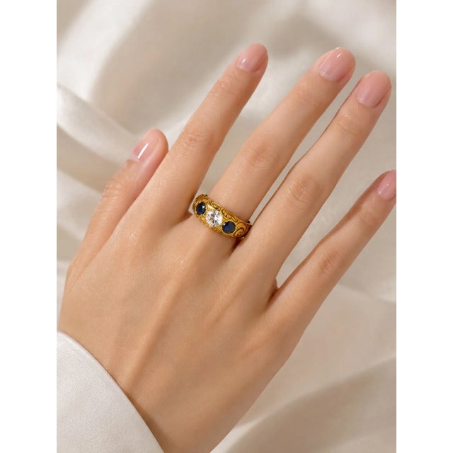 Elegant 14K yellow gold 3 stone wedding ring featuring sparkling diamonds and vibrant sapphires (carat weight not...