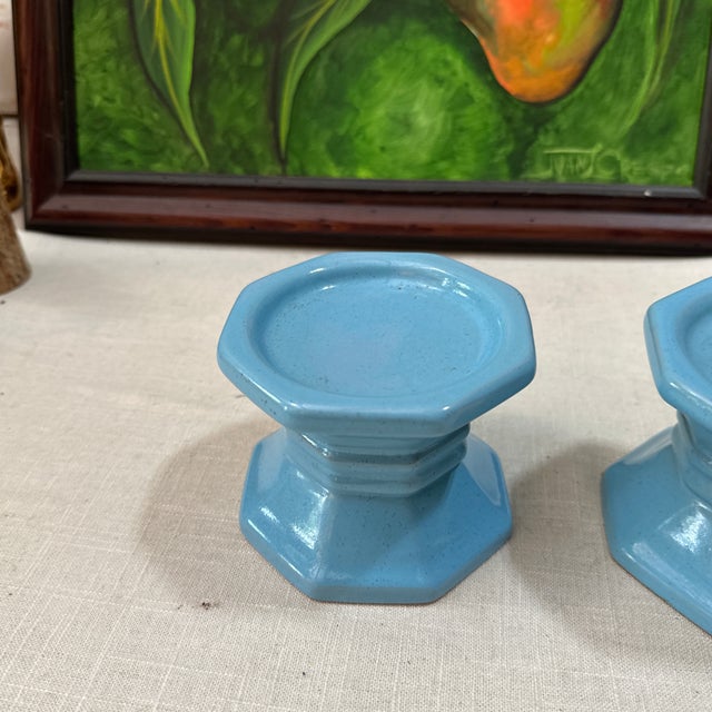 Up for consideration is a beautiful pair of blue ceramic candle holders. These would look lovely in your home and they are...