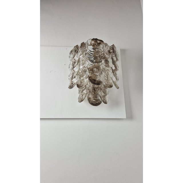 Wall Lamp in Iron and Murano Glass from Manifattura Di Murano, in Very Good conditions. Designed 1960 to 1969 I have...