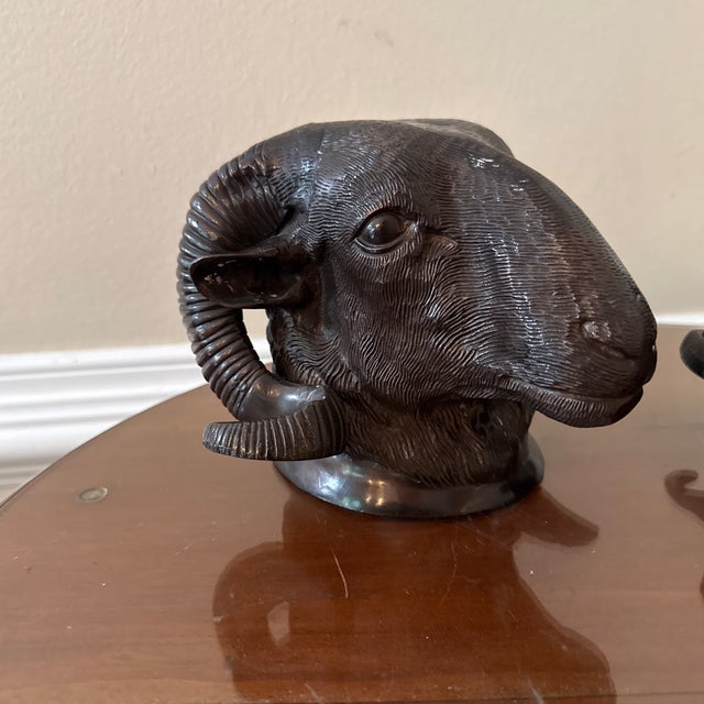 vintage pair of heavy cast bronze ram sculptures, could be mounted onto the wall, used as sculptures, bookend ect. good...