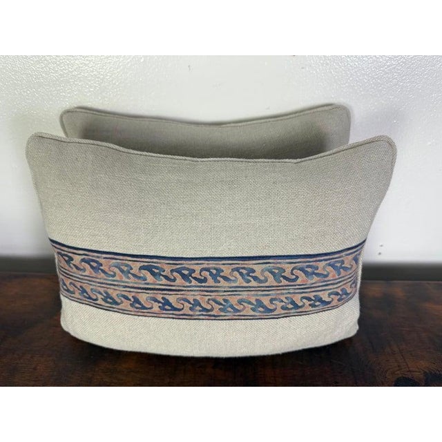 This charming pair of petite pillows combines understated elegance with a touch of historic luxury. Crafted from soft...