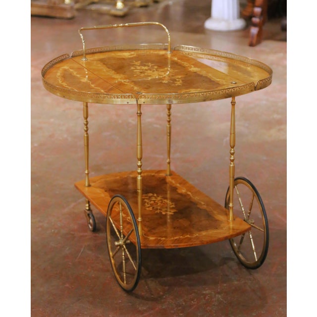 Serve in style with this elegant antique Italian bar cart, crafted circa 1960 and designed with both function and...