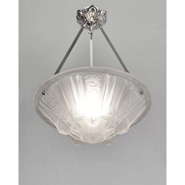 MULLER FRERES A beautiful French 1925-1930 art deco chandelier in nickel plated solid brass or bronze holding a rare bowl...