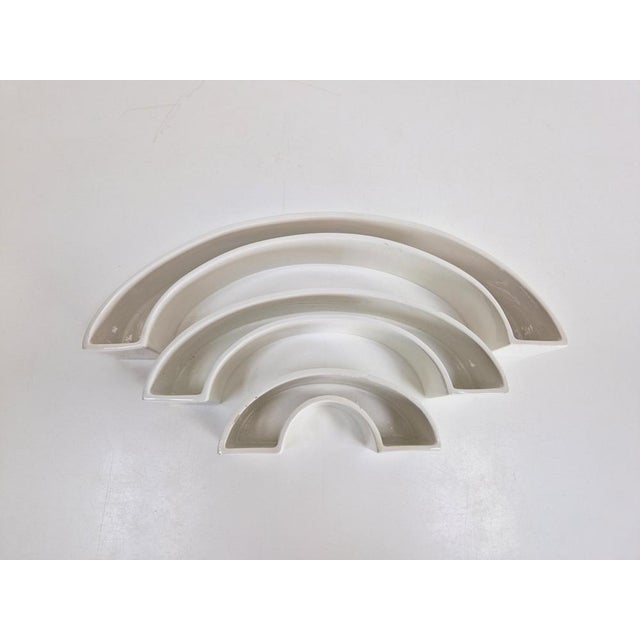 Italy, 1960s. A set of three Pinna Termiti-Tondo white ceramic nesting bowls by Angelo Mangiarotti for Danese Milano....
