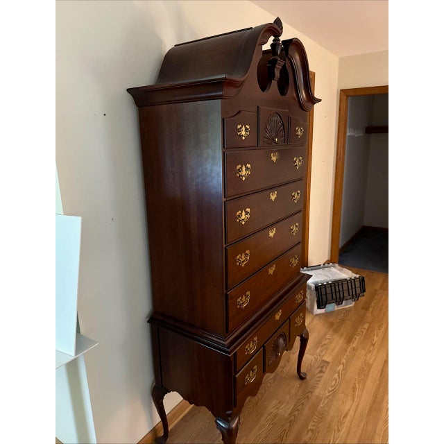 The Colonial Furniture Solid Cherry Queen Anne Highboy Shell Carving is a traditional and elegant piece of furniture, made...