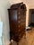 The Colonial Furniture Solid Cherry Queen Anne Highboy Shell Carving is a traditional and elegant piece of furniture, made...