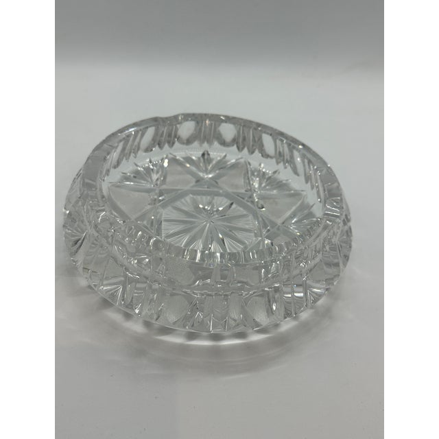 A stunning vintage cut crystal heavy clear glass ashtray with a beautiful cut Star design. Large sections to accommodate...