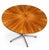 Elegant round extendable dining table produced by emu in italy during the 1960s. The table features a beautifully veneered...