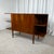 Low teak veneer sideboard, 1960s/70s, Midcentury Modern Vintage hi-fi cabinet with a central storage compartment featuring...