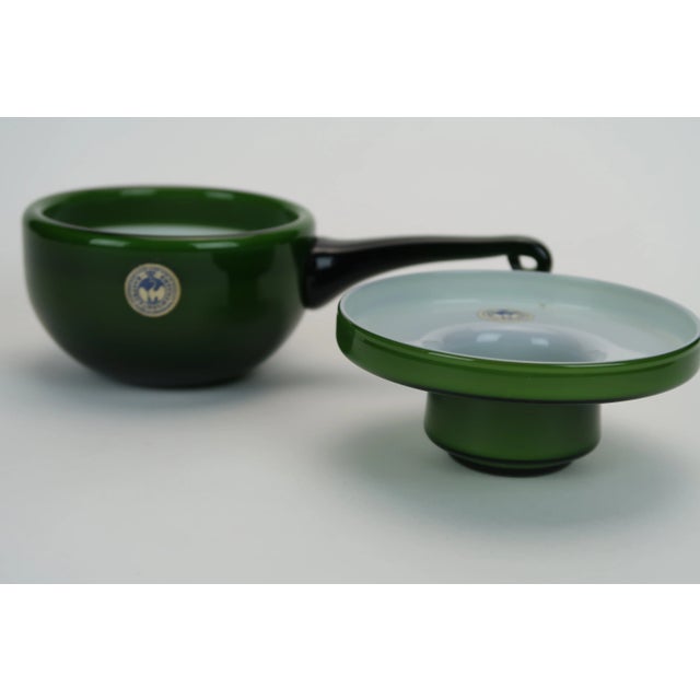 Jade Green cased glass with an opaque/white interior Manufactured by Holmegaard Glasværk in the small town of Næstved on...