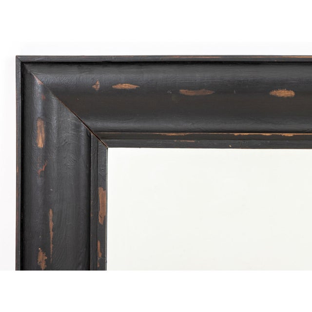 Rustic Ebonized Wood Framed Mirror. Mirror plate: 22.25" H x 38.25" W; frame: 36" H x 42" W x 1.5" D. Provenance: From a...