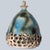 Stunning round hanging lamp with an unusual egg-like shape, made with rich colored green and blue ceramics, manufactured...