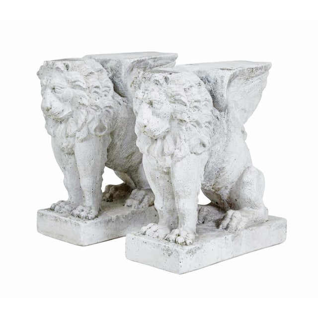 pair of early 20th century stone garden lion pedestals circa 1920. here we have a great pair of architectural stone lions...