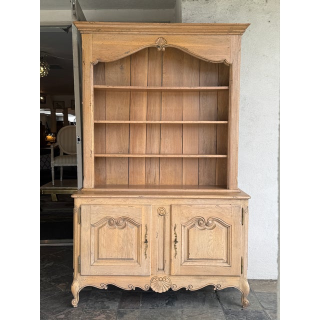 Design Plus Gallery presents a Kitchen Cabinet of Light Oak Wood. This antique cabinet is made from solid wood with a...