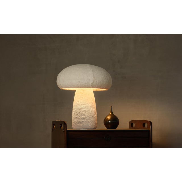Has there ever been a lamp more deserving of taking shape by mushroom inspiration? Made entirely of mycelium composite,...