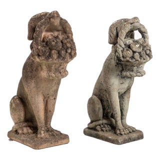 Matched Pair of Composite Stone Dogs With Fruit Baskets, England Mid 20th C. For Sale