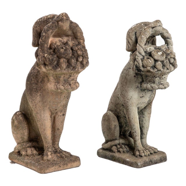 Matched Pair of Composite Stone Dogs With Fruit Baskets, England Mid 20th C. For Sale