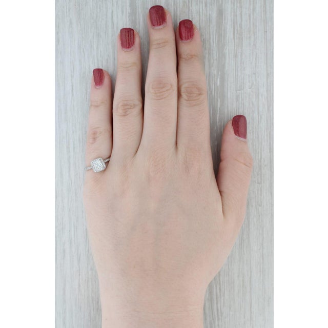 Gemstone Information: - Natural Diamond - Carats - 0.97ct Cut - Cut Corner Rectangle Modified Brilliant Color - K Clarity...