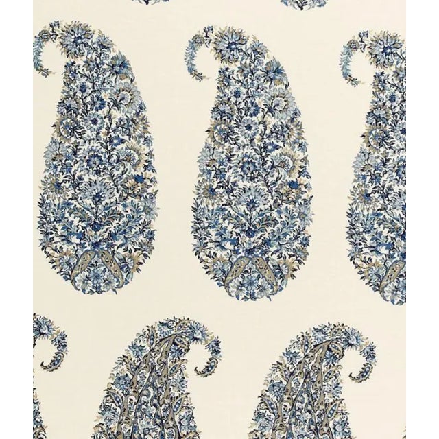 Based on a traditional Indian block print, this timeless paisley design features a grid of tear-shaped figures composed of...