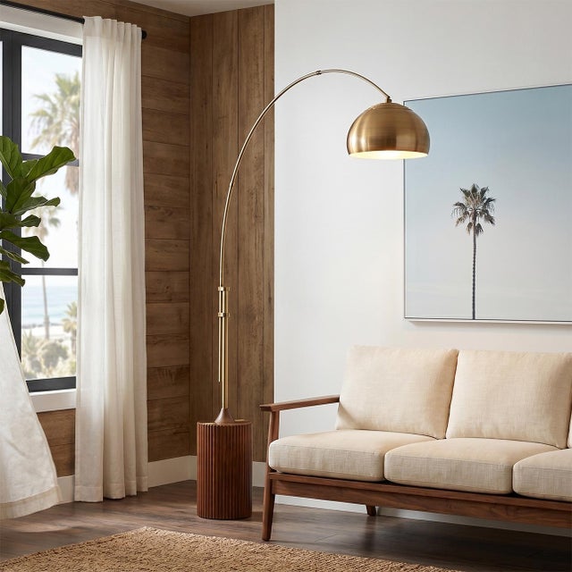 The Tambo Arc Lamp is a Mid-Century Modern masterpiece designed by Peter Morelli in 1984. This iconic arc lamp from NOVA...