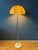 Very rare space age floor lamp with 'flower' shaped acrylic glass shade. The beige/yellow dome shade is made of thick...