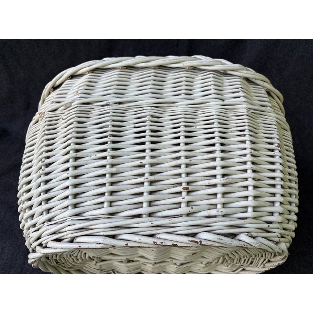 Charming, large vintage, chippy antique white painted gathering willow basket with a twisted top handle and a braided top...