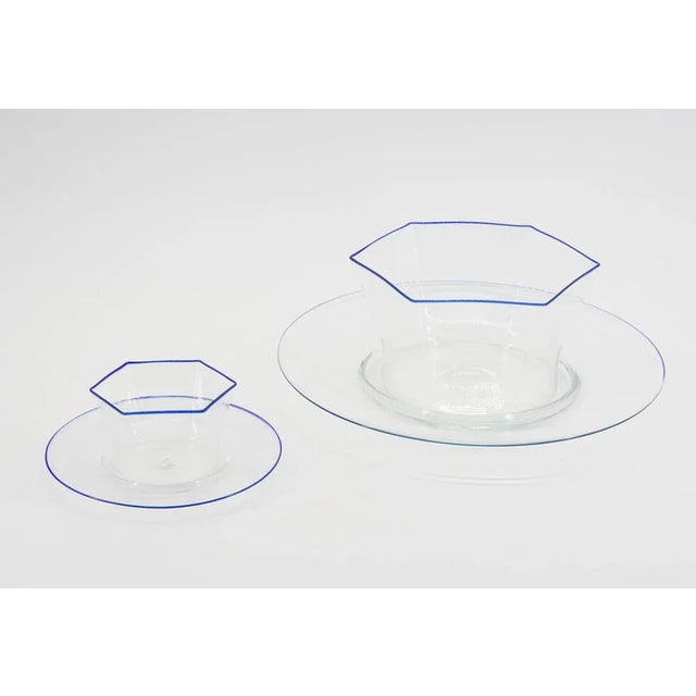 The service consists of 12 ice cream cups, 12 saucers, 1 large cup, 1 large dish I have official proof of authenticity...