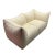 Original iconic Le Bambole loveseat 2-seater sofa, rendered in molded full foam structure with original cotton upholstery...