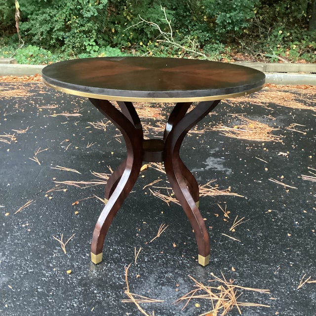 A sophisticated Ralph Lauren Home round pedestal table, beautifully restored and ready to anchor any space. The table...